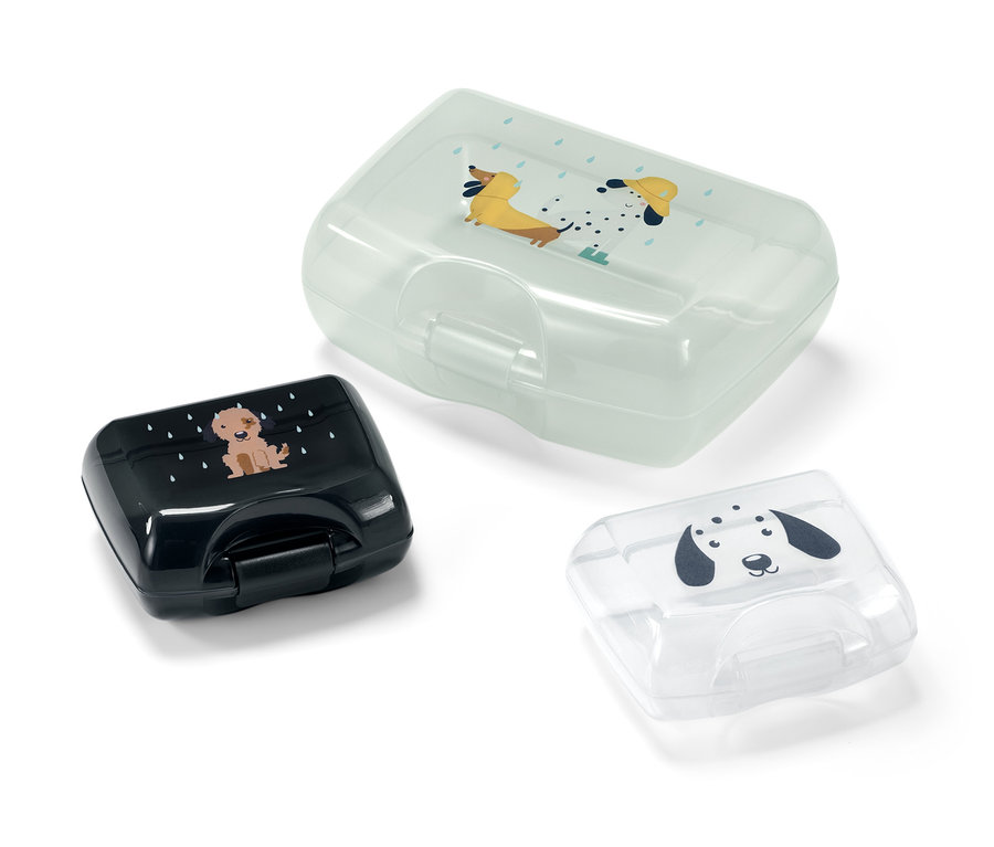 Trzy śniadaniówki z nadrukiem psów.