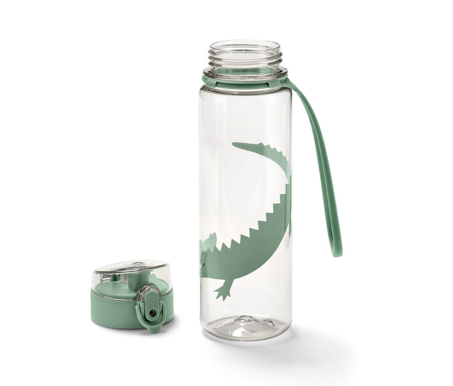 Beżowy bidon z nadrukiem krokodyla i zieloną nakrętką obok.