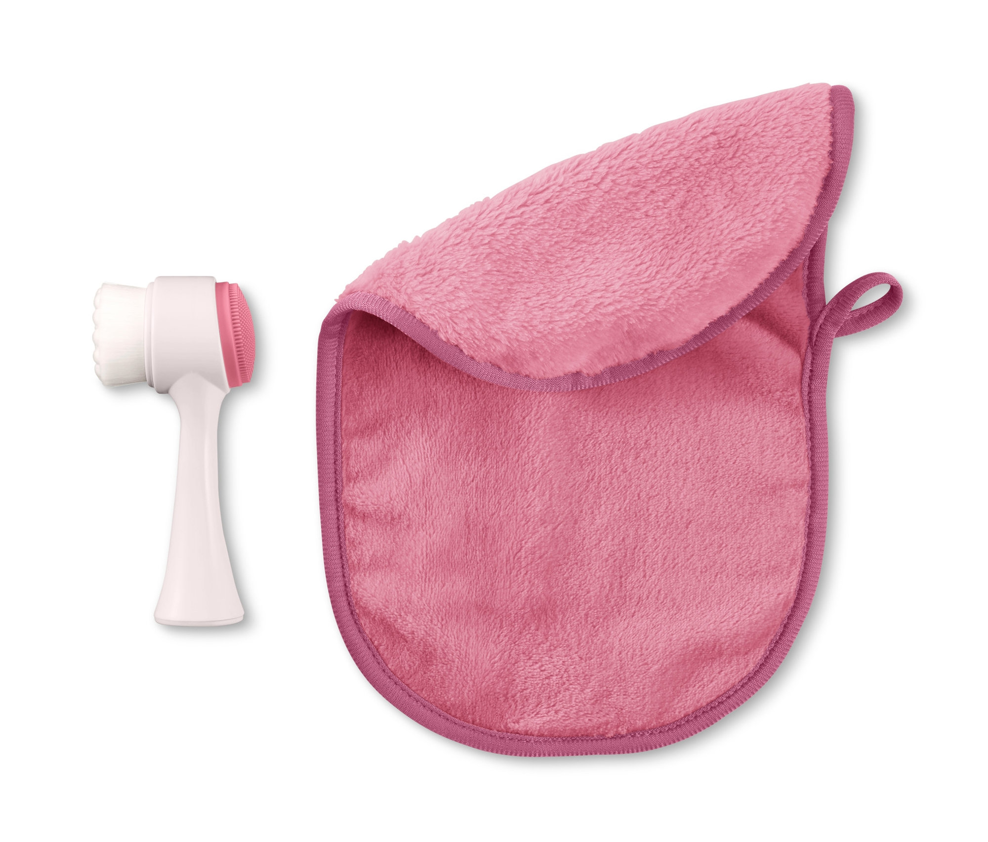 Szczoteczka do oczyszczania twarzy i ręcznik kosmetyczny leżą obok siebie.