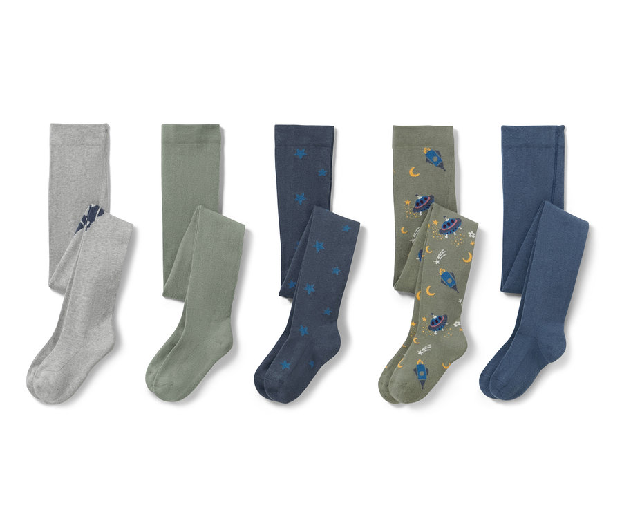 Pięć par bawełnianych rajstop z motywem kosmosu.