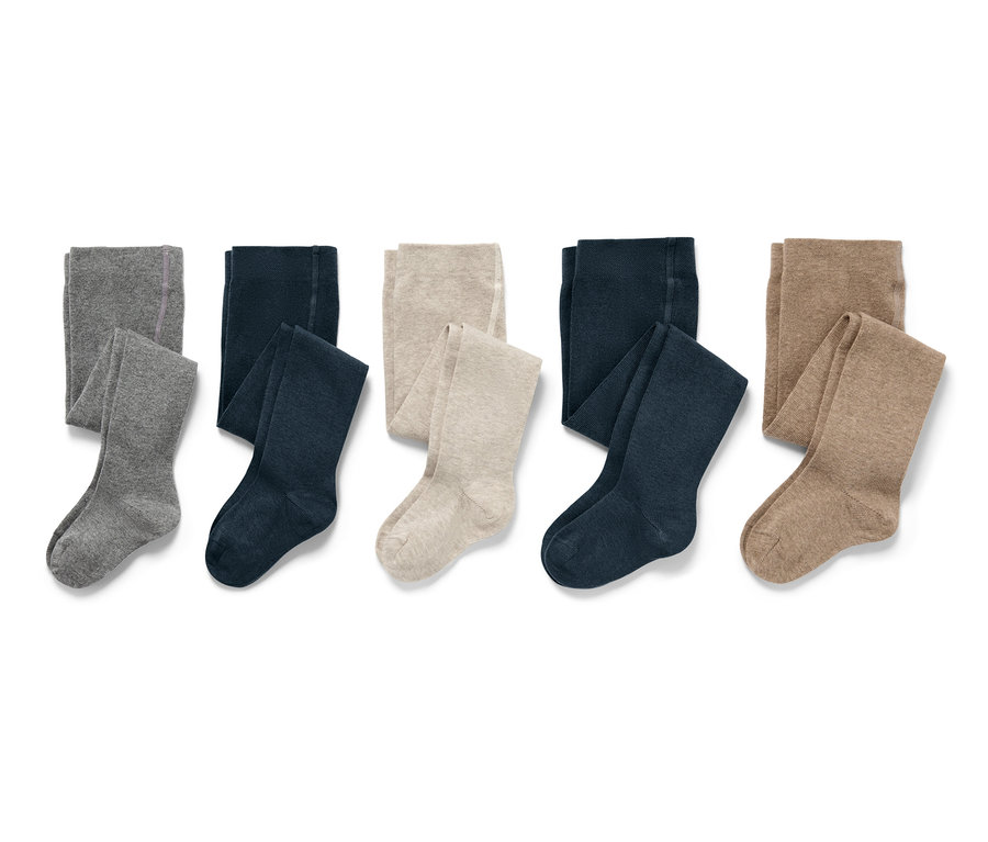 Pięć par rajstop dziecięcych w kolorach szarym, granatowym i beżowym.
