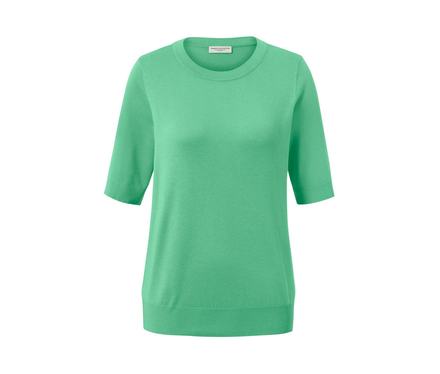 Jasnozielony sweter z delikatnej dzianiny.