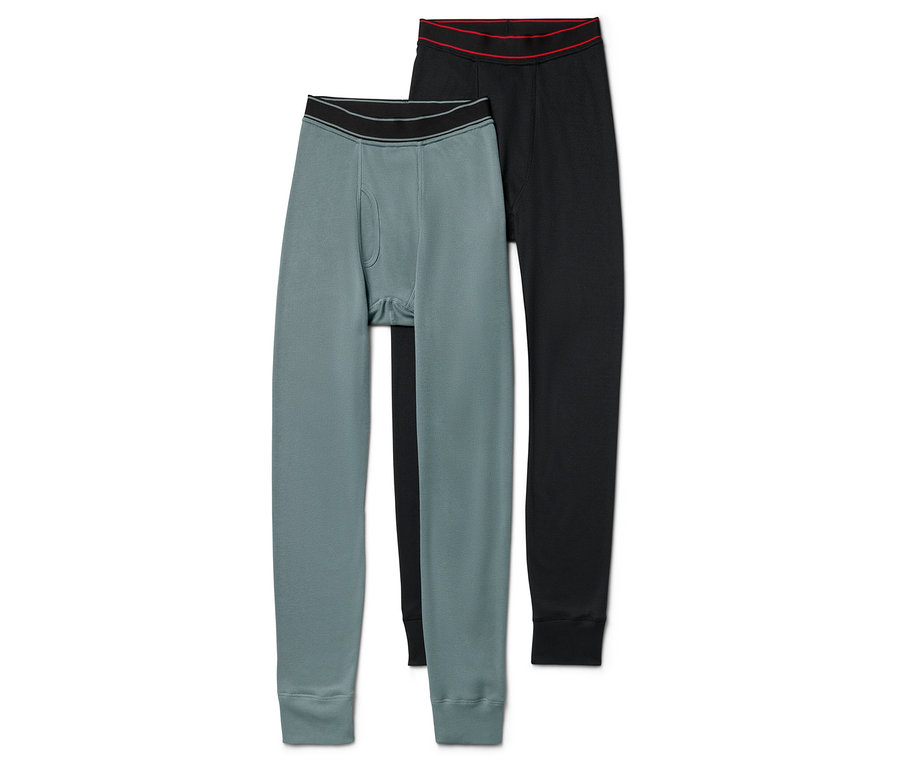 Dwie pary męskiej bielizny termoaktywnej: szarozielona i czarna.