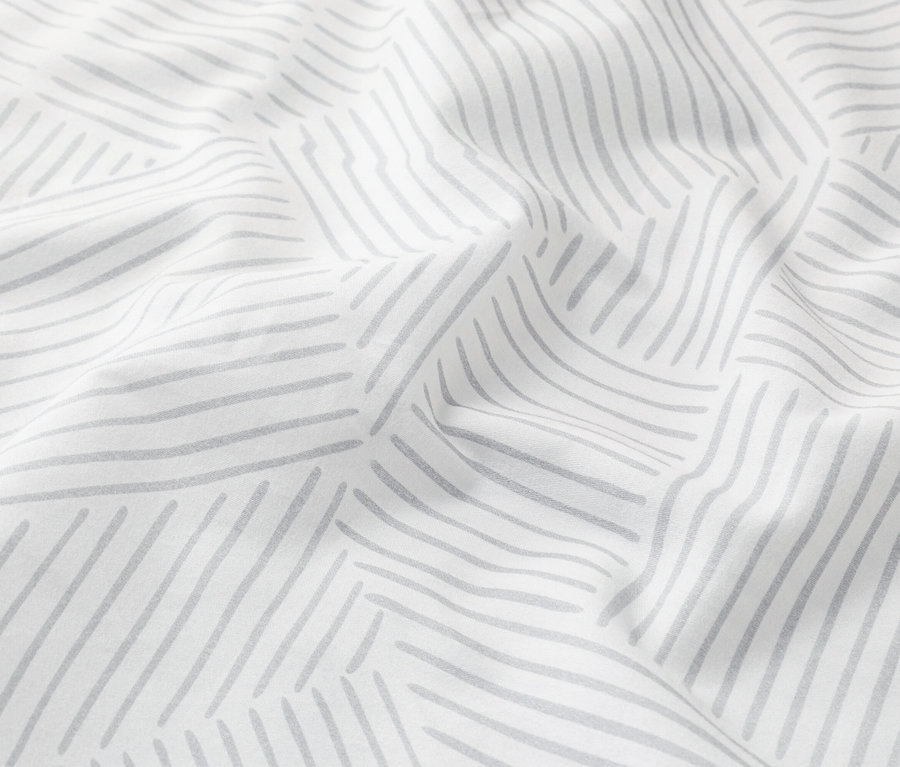 Zbliżenie białej tkaniny w szare linie.