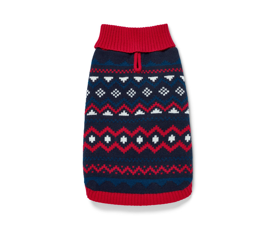 Sweter dla psa z dzierganym wzorem w kolorze niebieskim, czerwonym i białym.