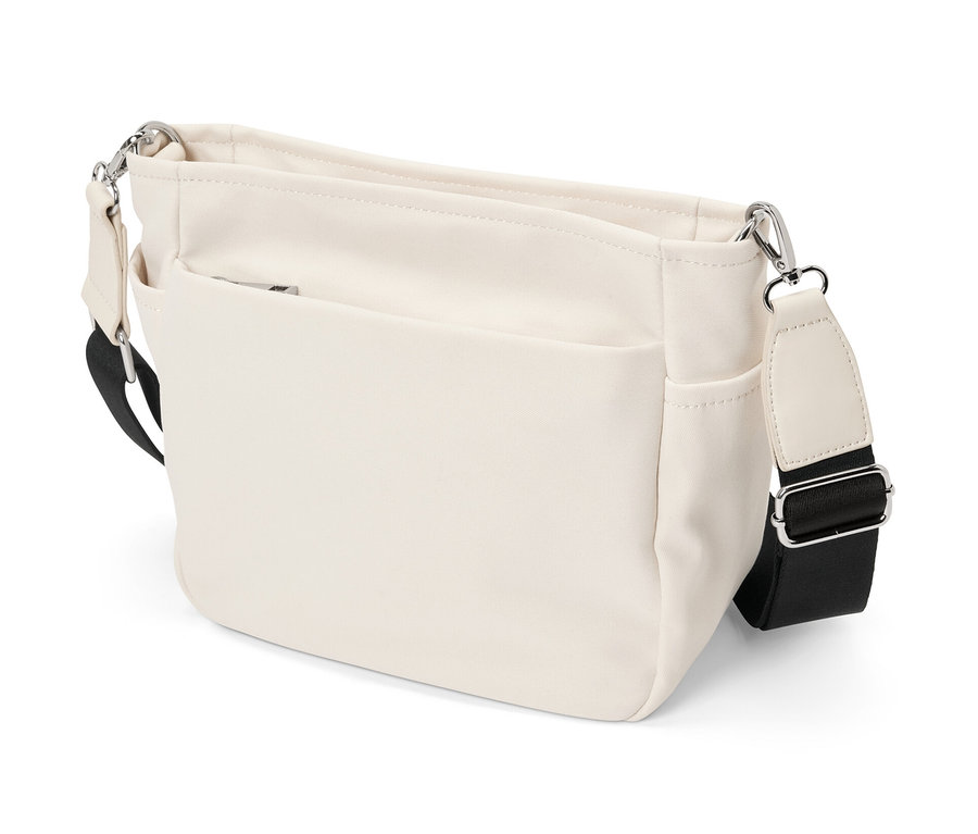 Kremowa płócienna torba na ramię z czarnym paskiem.