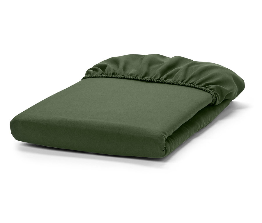 Złożone zielone prześcieradło z gumką.