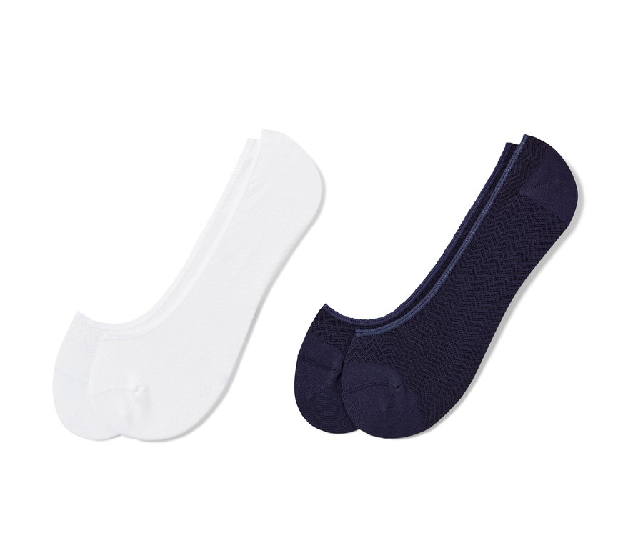 Dwie pary skarpet stopek: białe i granatowe.