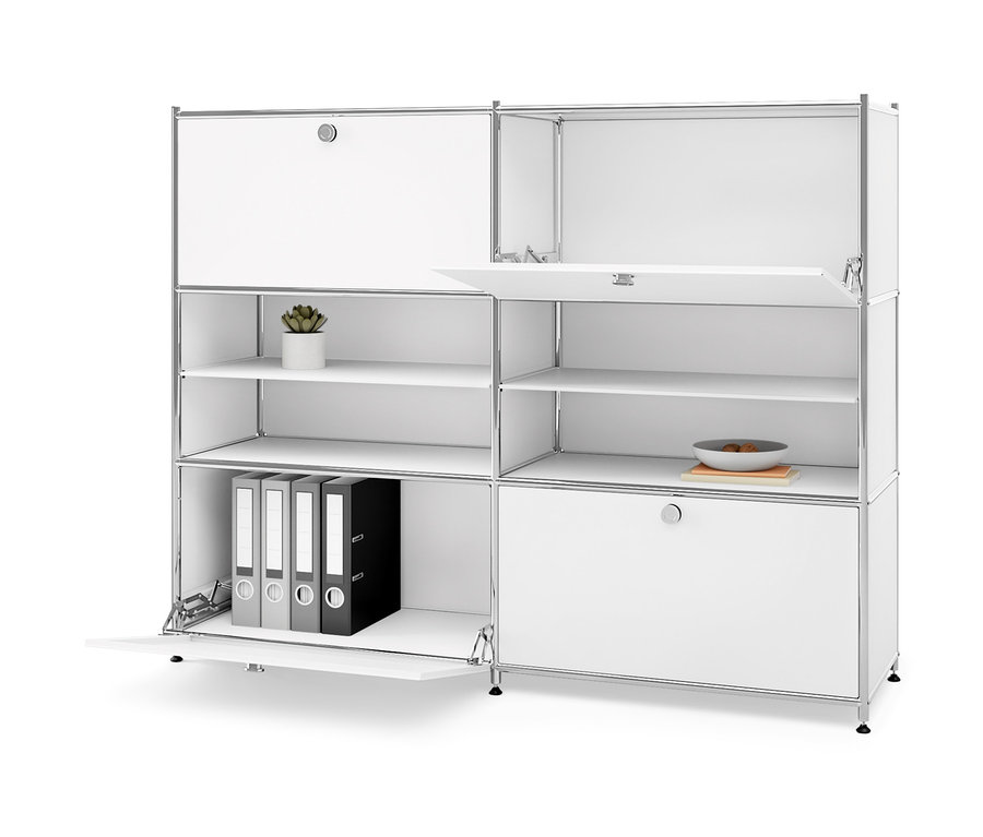 Biała komoda metalowa »CN3« z 4 przegródkami z klapami, z których niektóre są otwarte. Na półkach roślina doniczkowa, miska i segregatory.