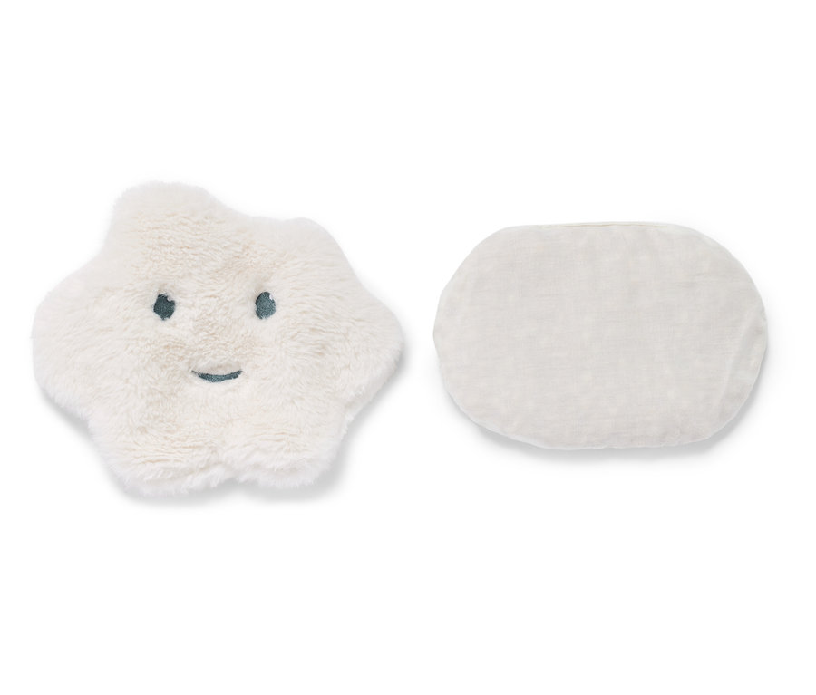 Poduszka rozgrzewająca z pestkami wiśni w kształcie chmurki i owalna poduszka obok siebie.