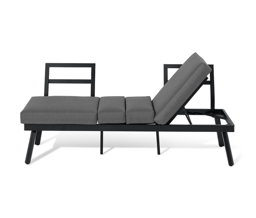 Czarno-szara sofa 2 w 1 z podnoszonym stolikiem w pozycji leżącej.