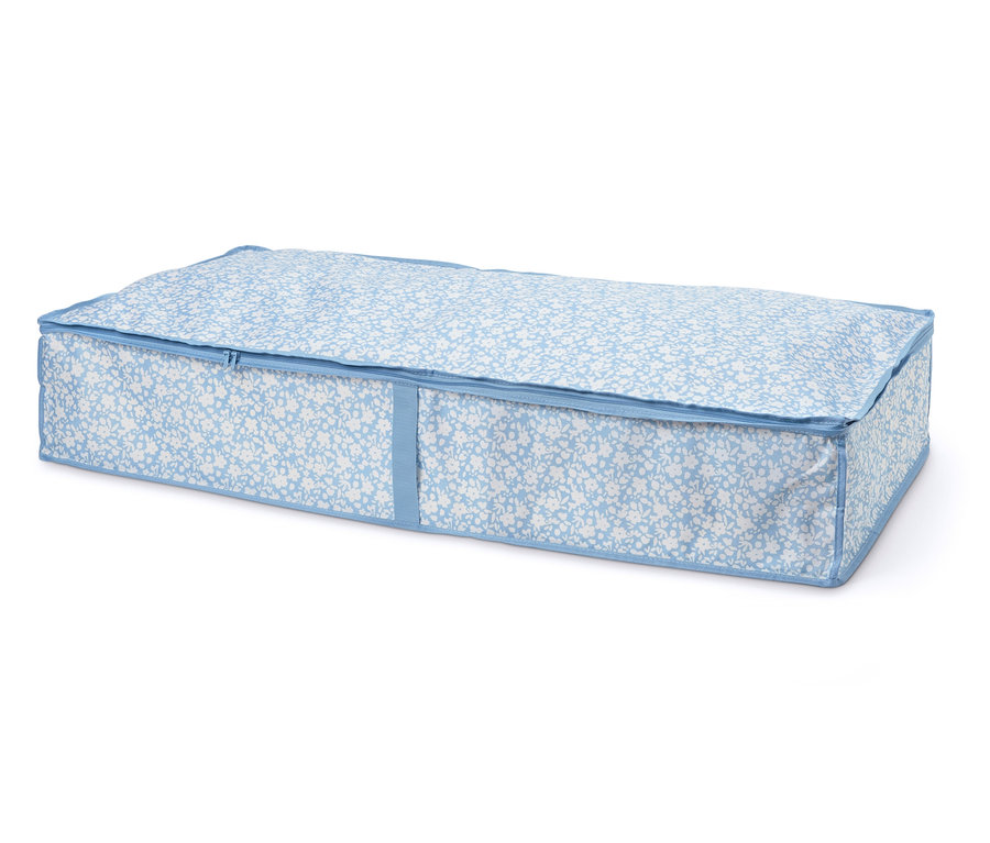 Pojemnik pod łóżko w kolorze biało-niebieskim z kwiatowym wzorem, zapinany na zamek błyskawiczny.