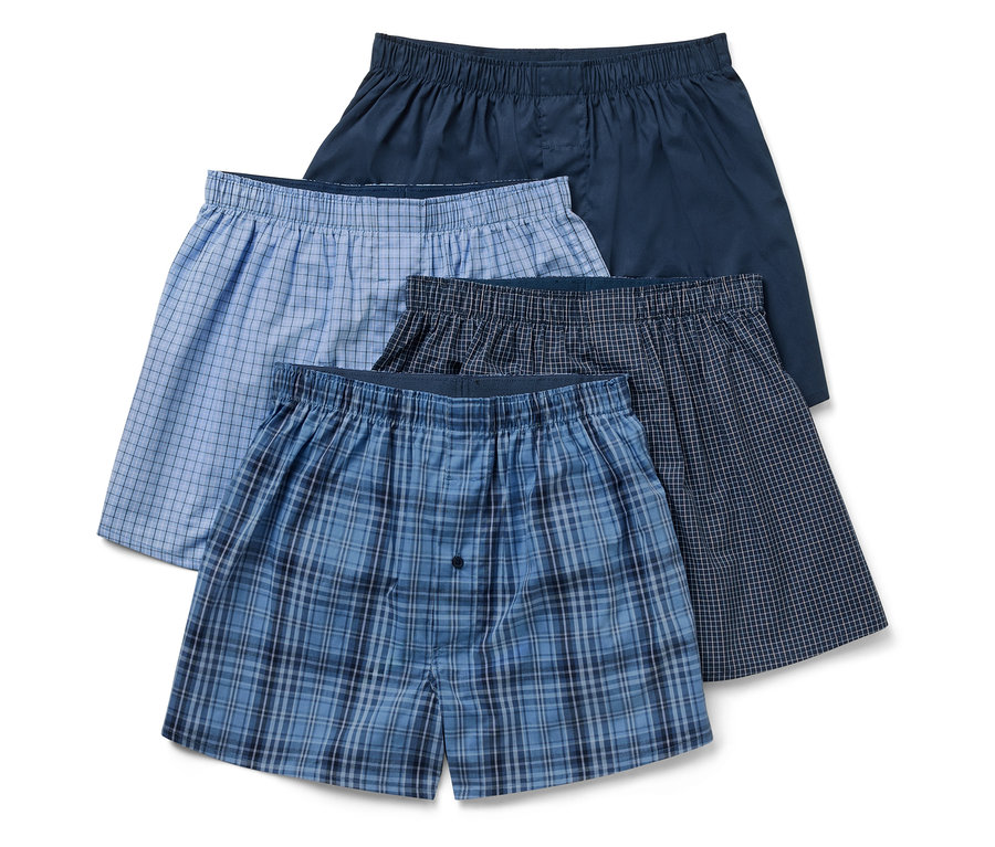 Cztery bokserki męskie w różnych kolorach i wzorach.