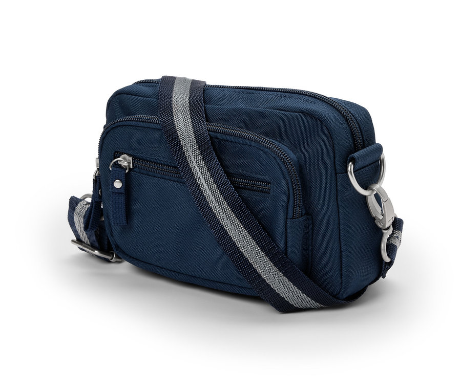 Granatowa antykradzieżowa torba na ramię lub biodra ze srebrnym zamkiem błyskawicznym i paskiem w paski.