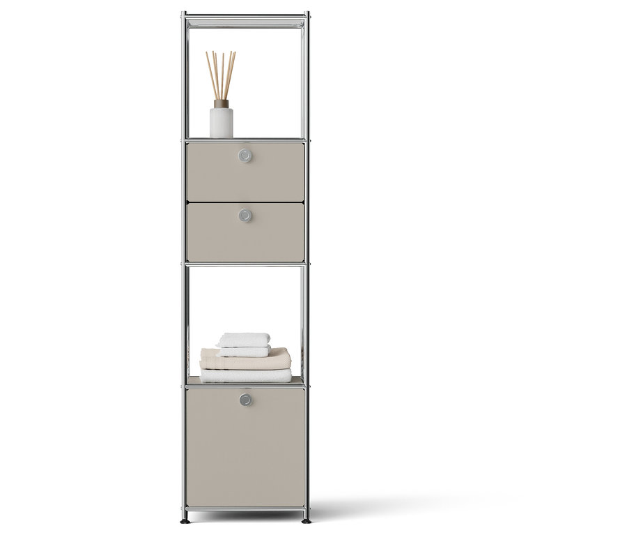 Wąski srebrny regał z dwiema szufladami, szafką i dyfuzorem.