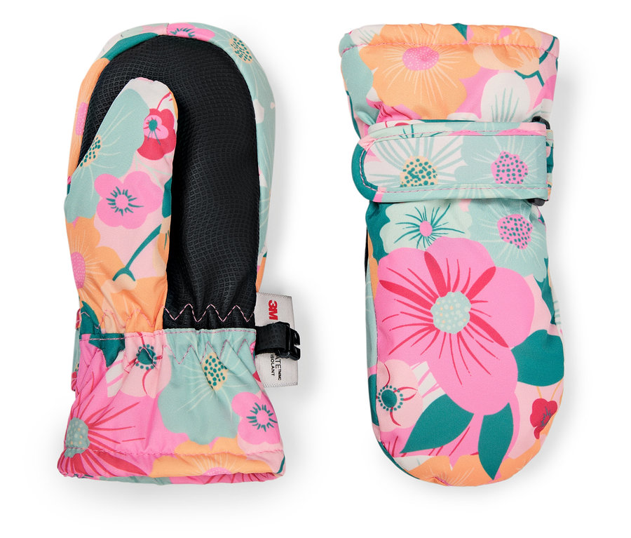 Dwie rękawice z kwiatowym wzorem leżą obok siebie.