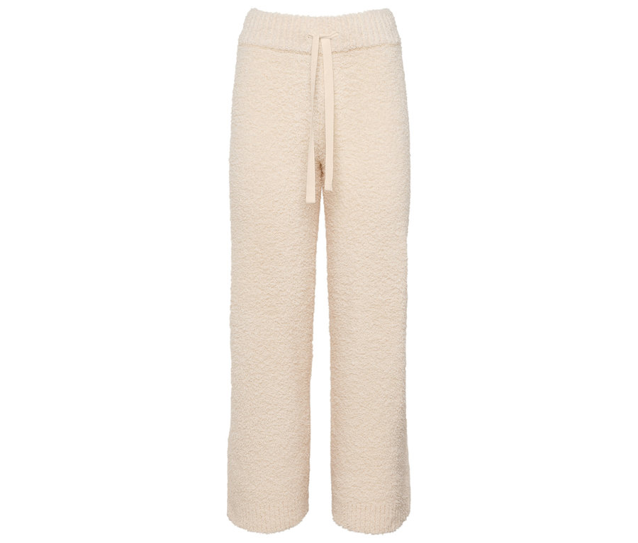 Kremowe spodnie dzianinowe ze sznurkiem.
