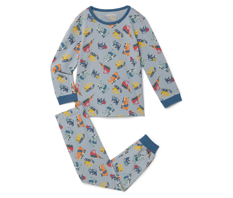 Jasnoszara piżama z motywem koparki leży płasko na białej powierzchni.