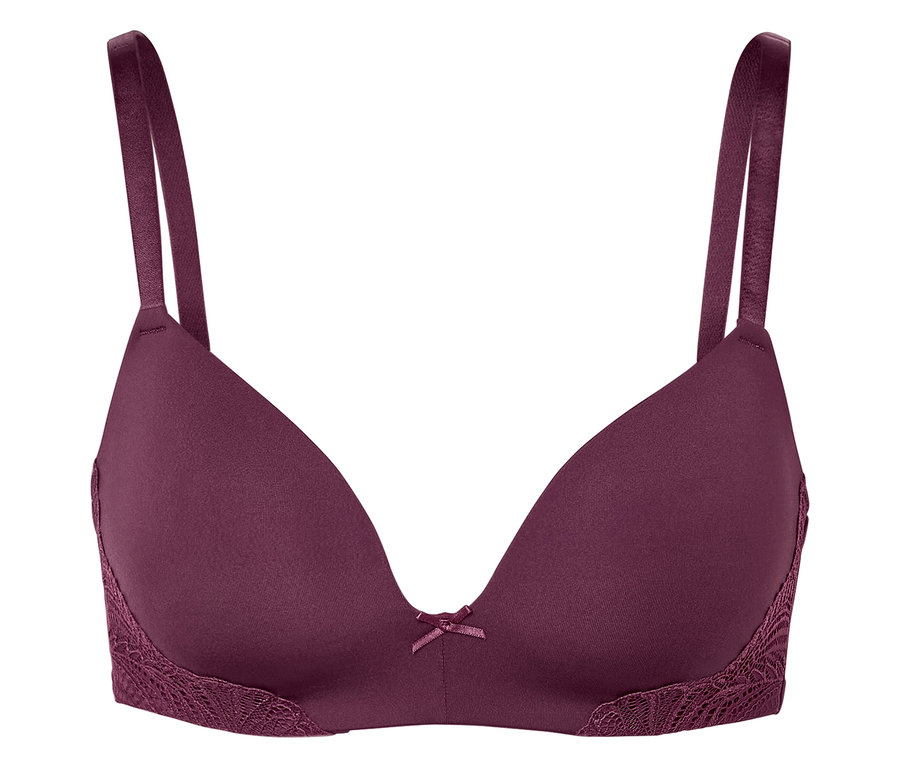 Fioletowy biustonosz z koronką i kokardką pośrodku.