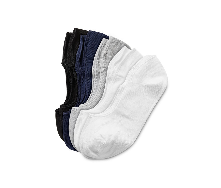 Pięć par czarnych, granatowych, szarych i białych skarpet stopek.