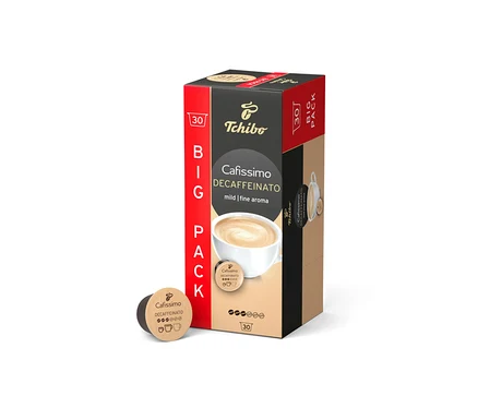 Pionowo stoi opakowanie Tchibo Cafissimo Decaffeinato - 30 kapsułek. Obok leży kapsułka.