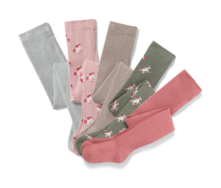 Pięć par bawełnianych rajstop z motywem jednorożca.