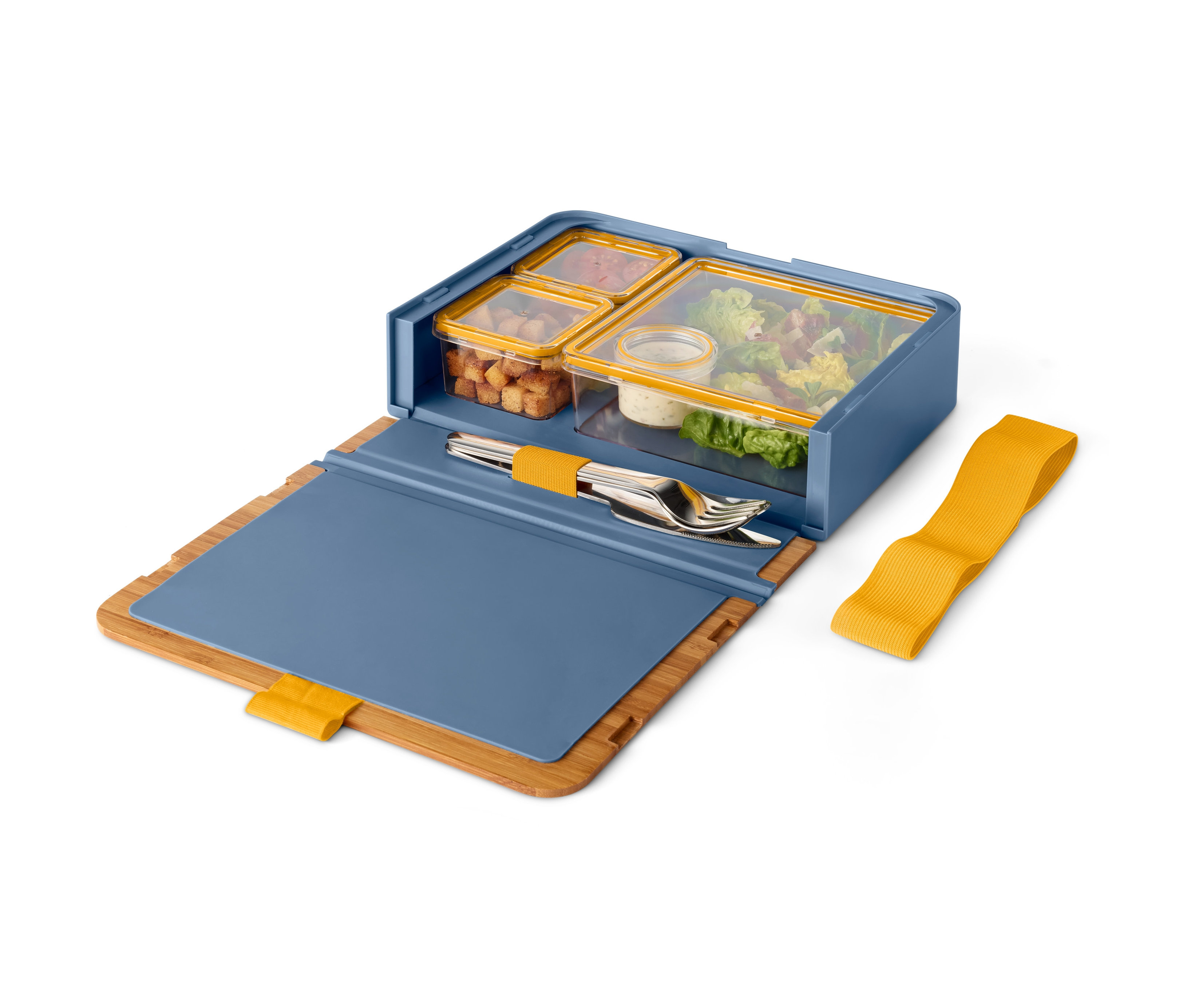 Otwarty niebieski zestaw pojemników na przekąski i kanapki z przezroczystymi pojemnikami na sałatę, grzanki i sos.