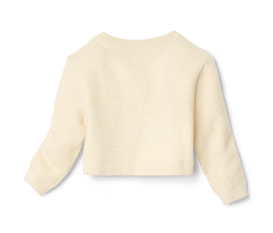 Kremowe bolerko z dzianiny.