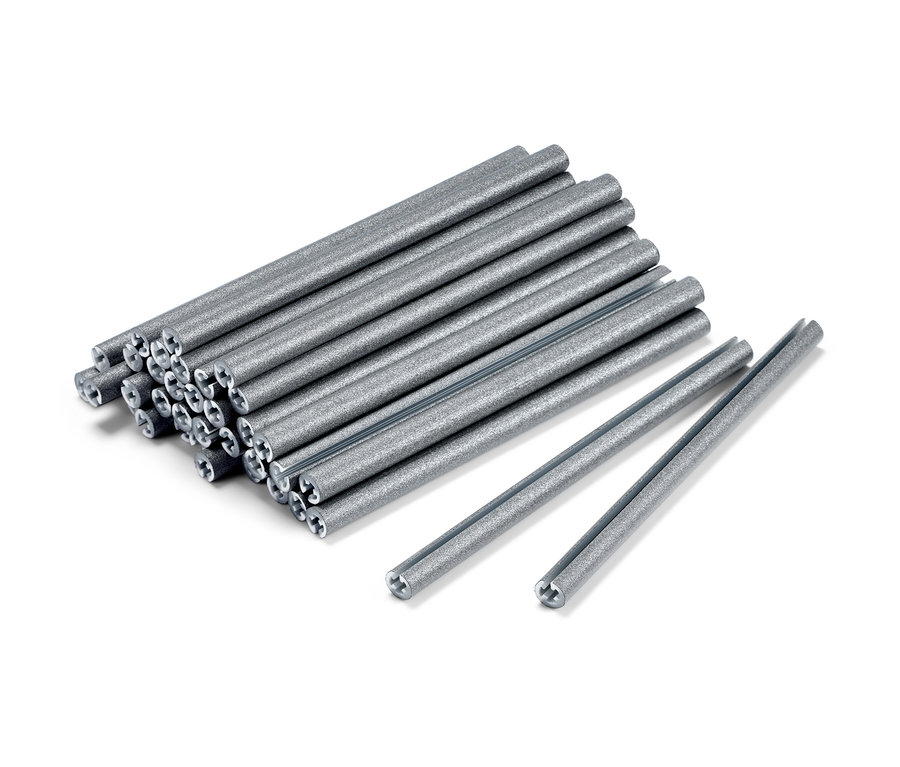 Na białym tle leżą 36 sztuk odblasków na szprychy.