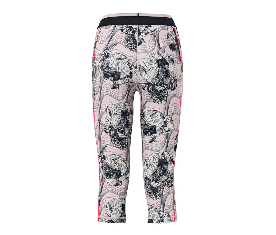 Detal legginsów sportowych o długości 3/4 z kwiatowym wzorem.