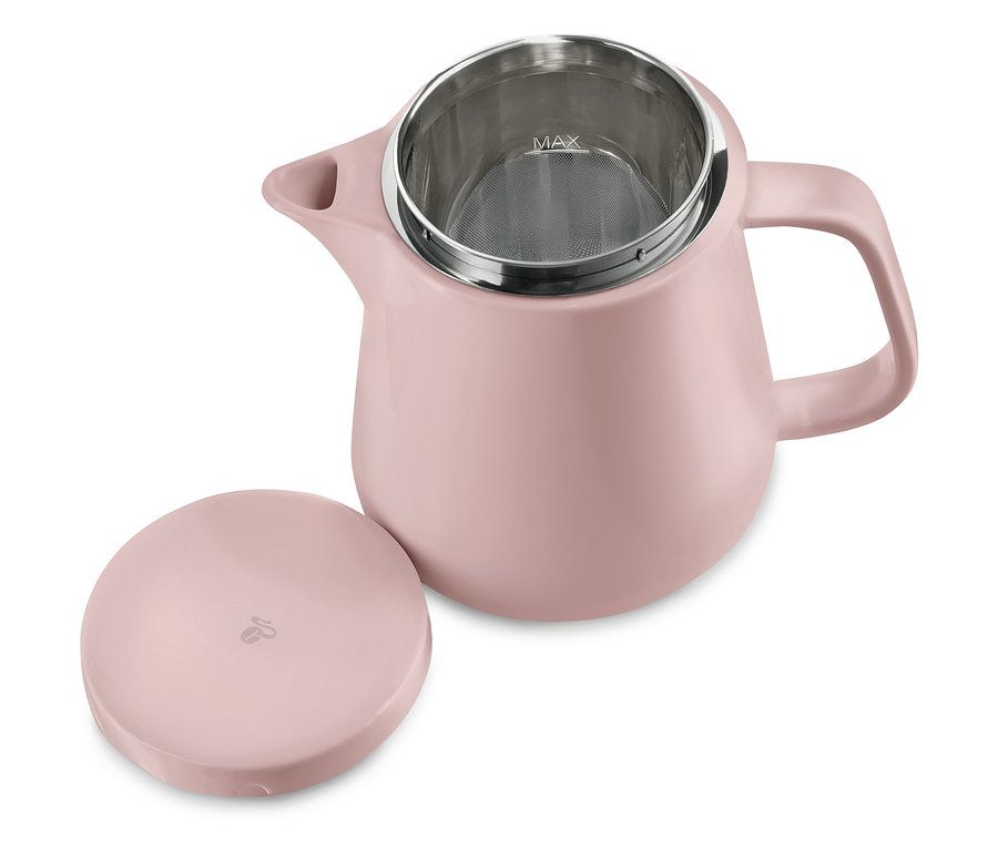 Różowy ceramiczny zaparzacz do kawy z filtrem ze stali nierdzewnej i pokrywką obok.