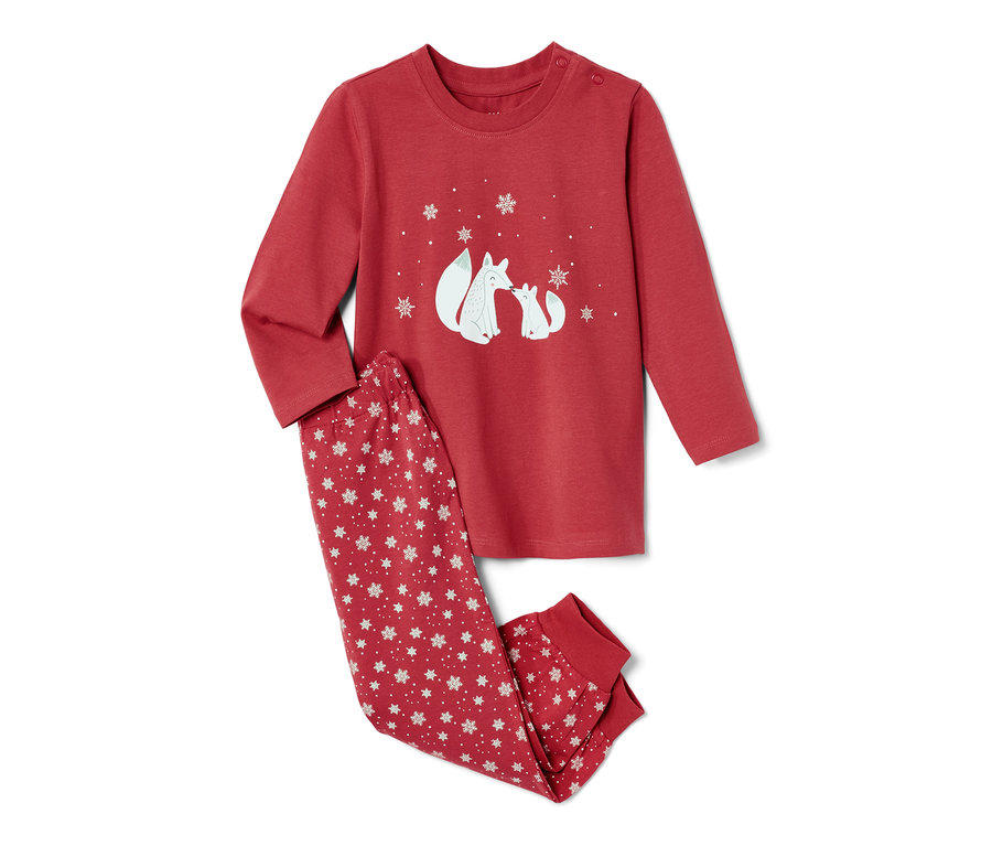 Dziecięca piżama świecąca w ciemności, z liskiem. Czerwona góra z liskiem i spodnie we wzór płatków śniegu.