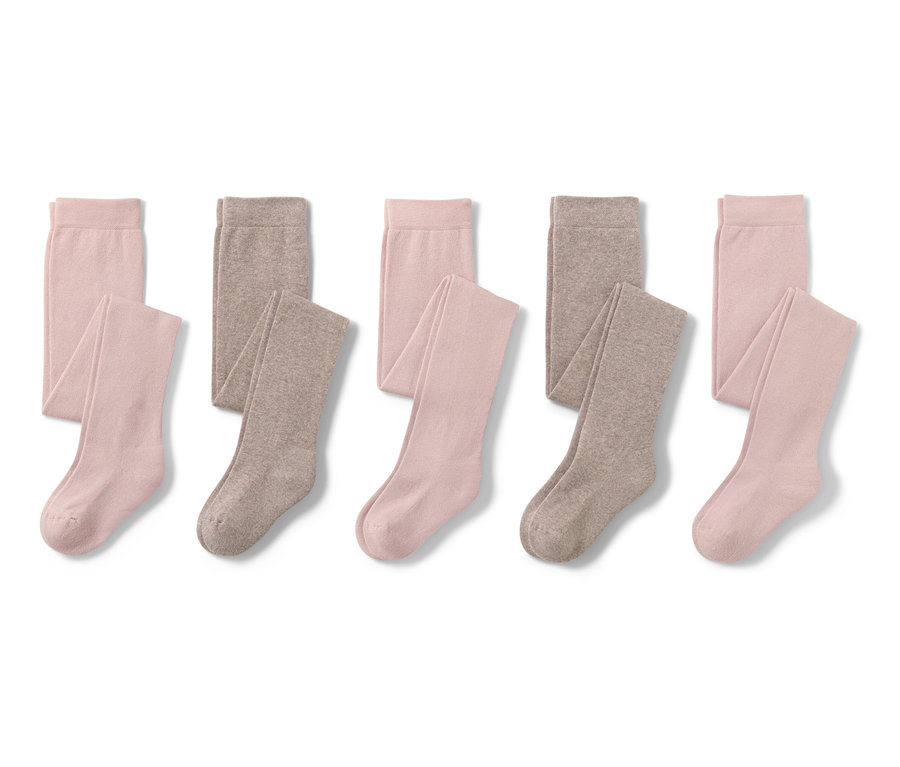 Pięć par bawełnianych rajstop w kolorze różowym i brązowym.