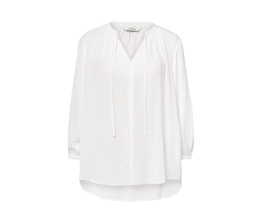 Biała bluzka-tunika z długimi rękawami i dekoltem w serek.