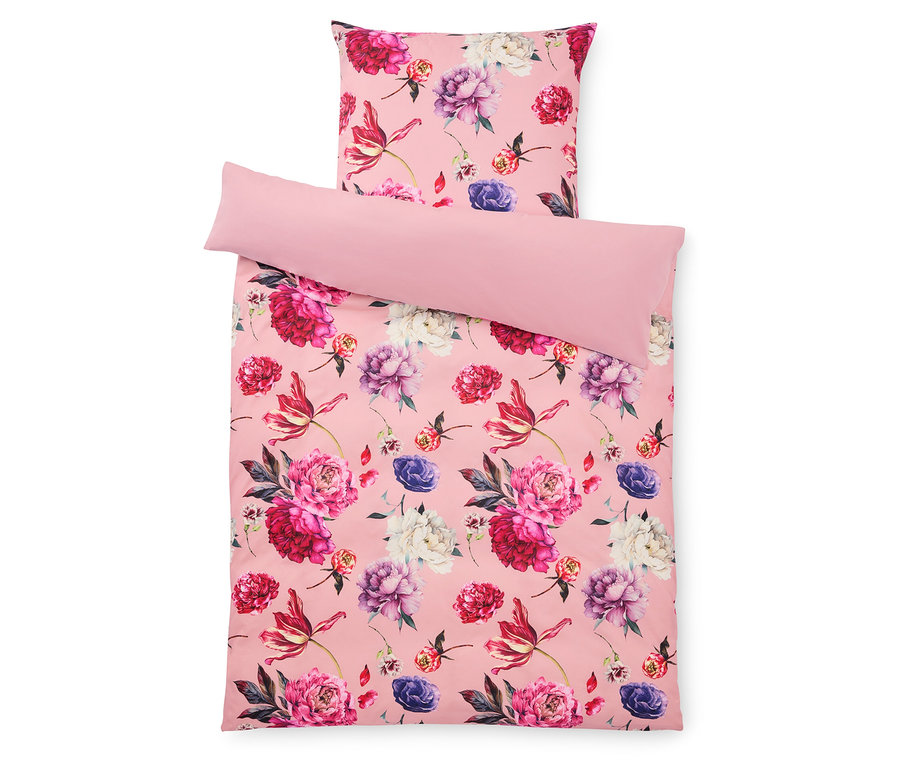 Różowy zestaw pościeli w kwiaty z poduszką i poszewką.
