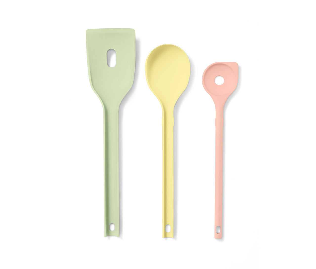 Akcesoria kuchenne, 3 sztuki, w kolorach: zielonym, żółtym i różowym, na białym tle.