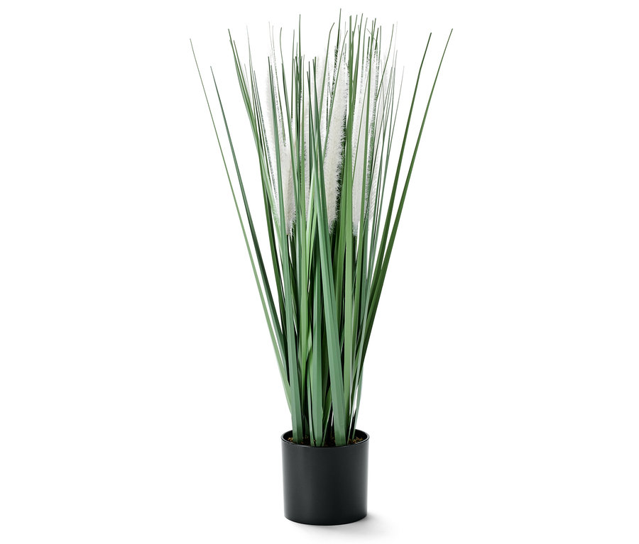 Sztuczna roślina w doniczce.