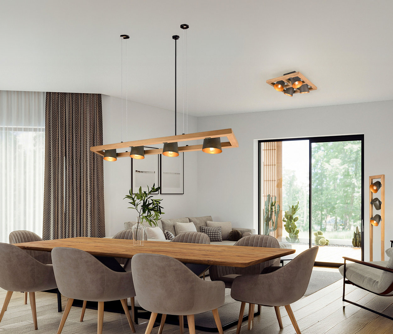 Stół jadalny z sześcioma krzesłami pod lampą wiszącą Trio „Bell”, 4-punktową. Dodatkowa lampa Trio zamontowana jest na suficie.