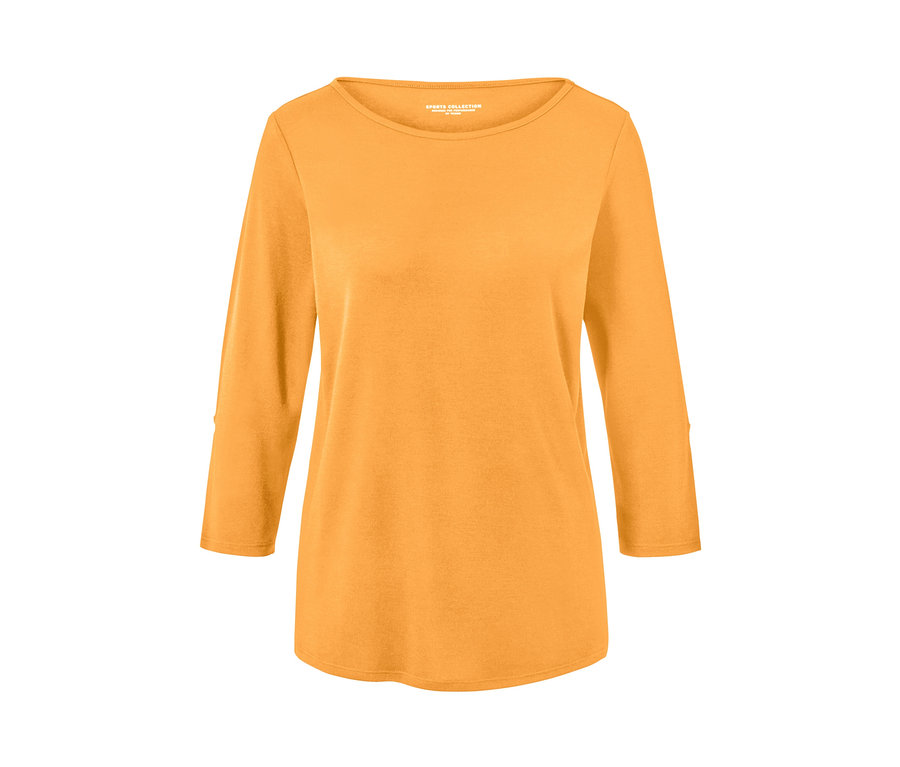 Pomarańczowa koszulka funkcyjna z rękawami 3/4.