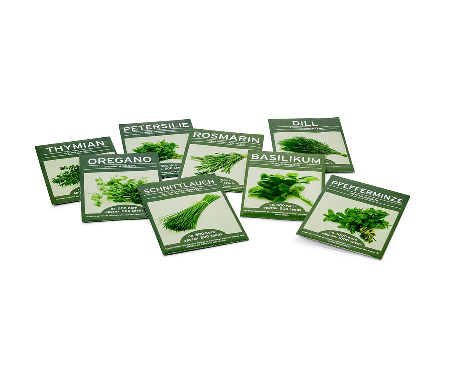 Na zdjęciu widoczne są opakowania nasion 8 klasycznych ziół, w tym tymianku, oregano, pietruszki, rozmarynu, szczypiorku, kopru, bazylii i mięty pieprzowej.