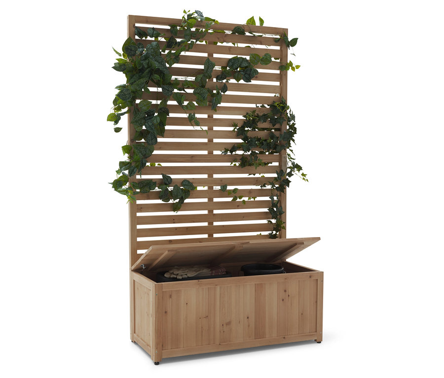 Drewniana ławka z kratką i otwartym wiekiem, pokryta zielonymi roślinami.