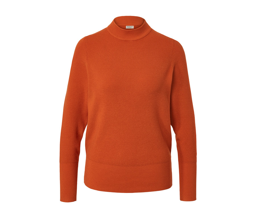 Pomarańczowy sweter z dzianiny.