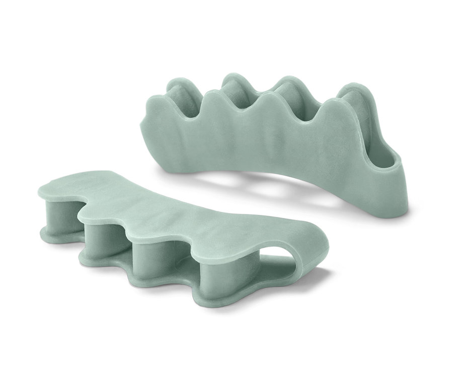 Dwa jasnozielone separatory palców u stóp.