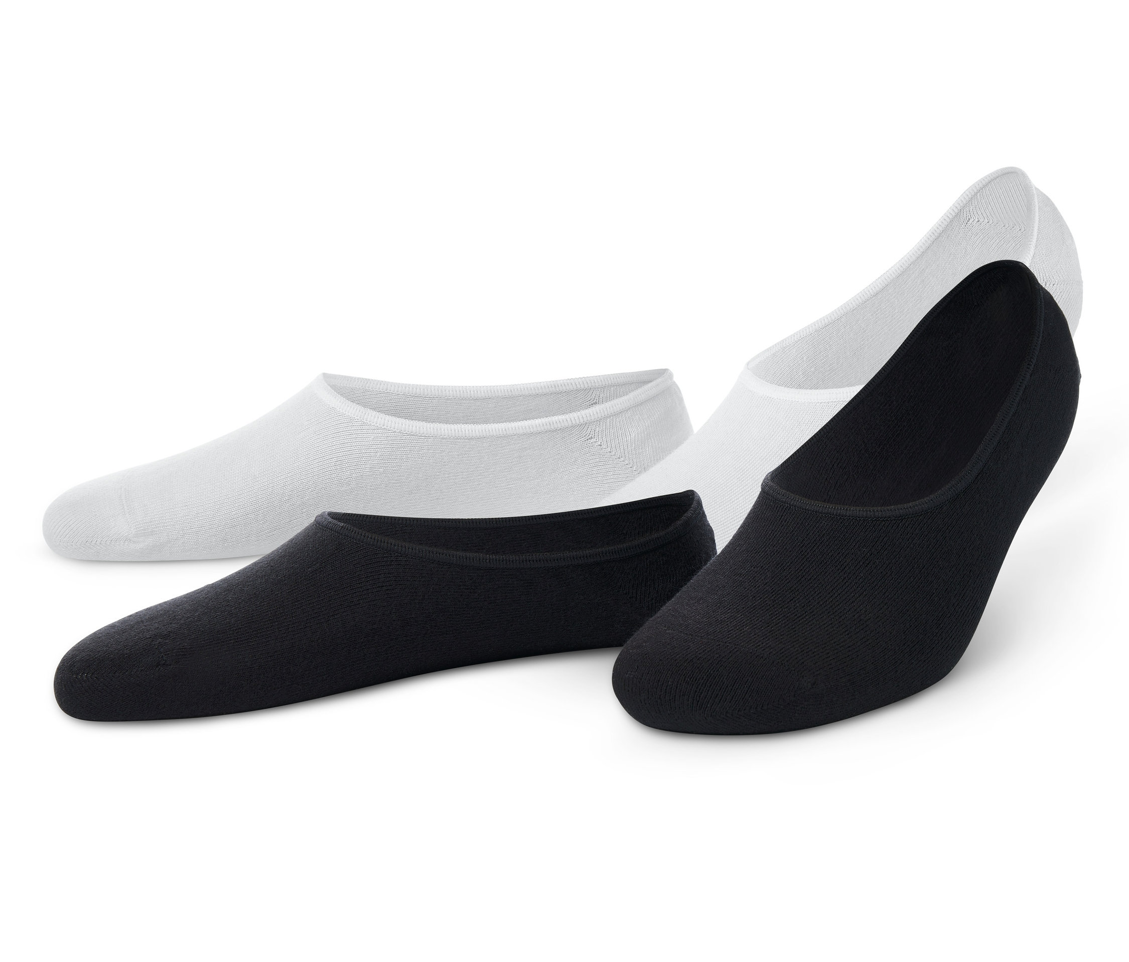 Dwie pary damskich stopek do sportowych butów: czarne i białe.