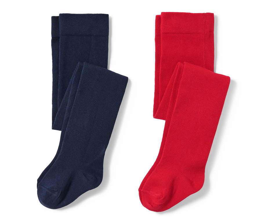 Dwie pary rajstop dziecięcych: jedna granatowa, a druga czerwona.
