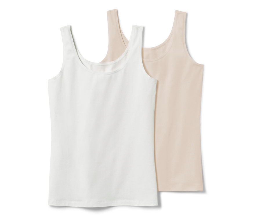 Dwa podkoszulki, 2 sztuki, w kolorze białym i kremowym leżą obok siebie.