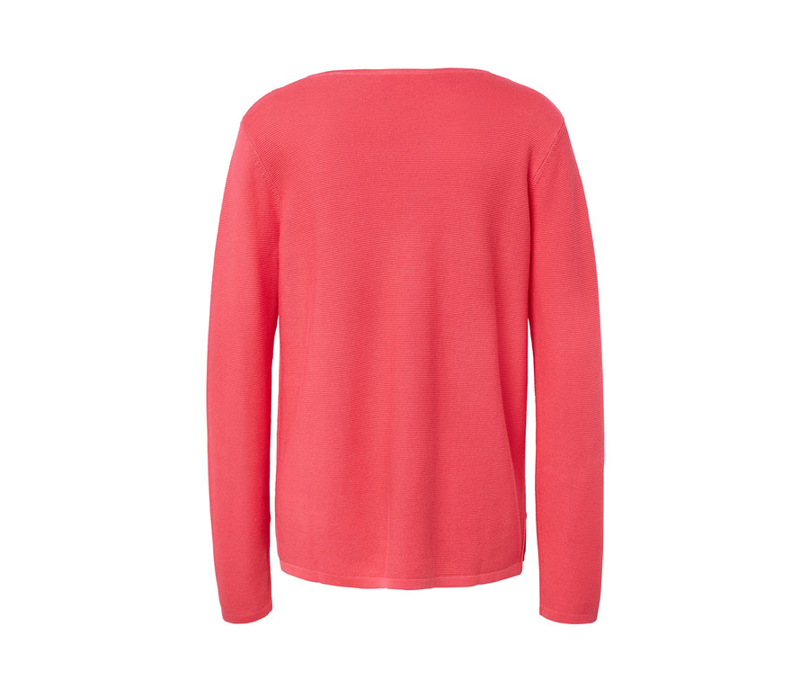 Koralowy sweter.