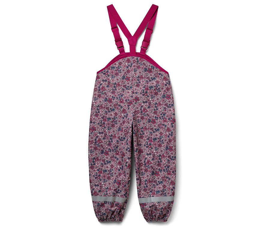 Dziecięce spodnie ogrodniczki we wzór kwiatowy.