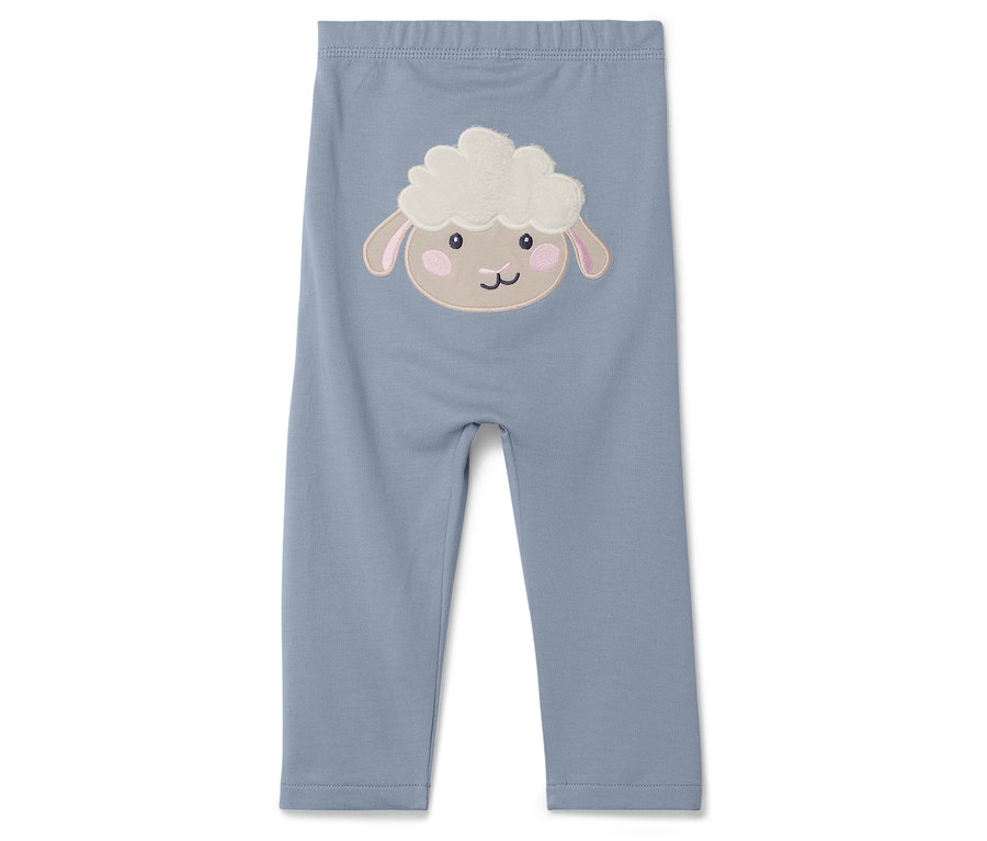 Niebieskie legginsy z naszywką owcy.
