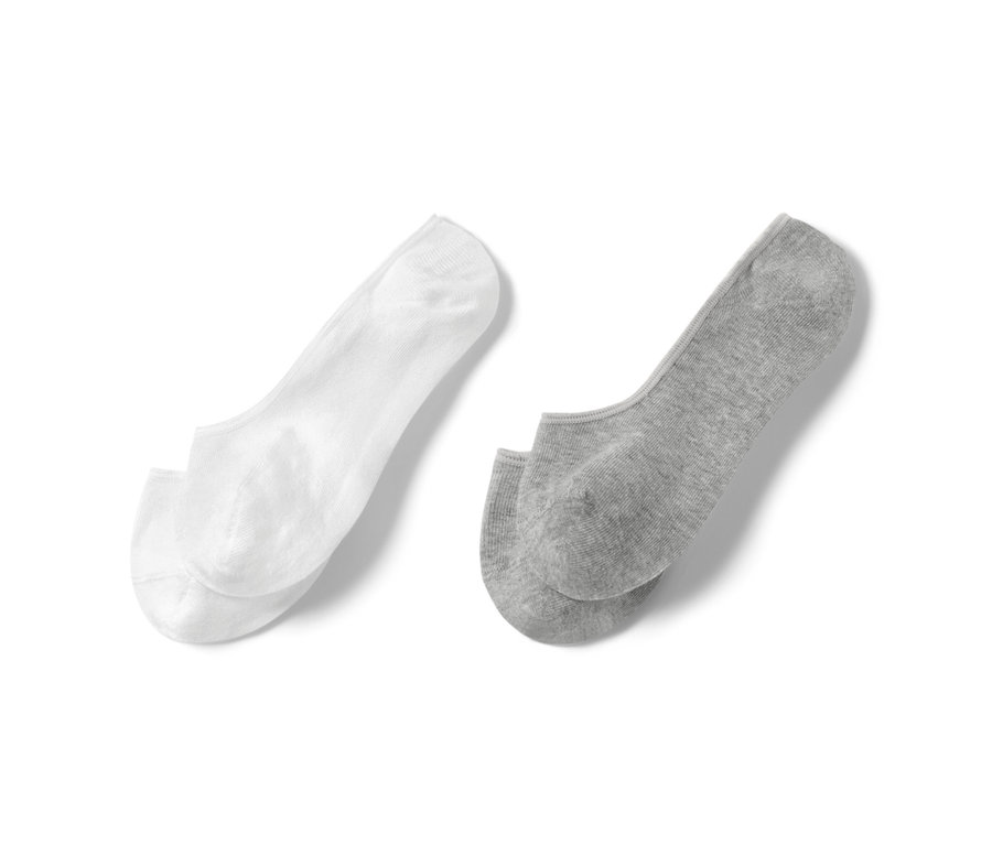 Dwie pary skarpet stopek: jedna biała i jedna szara.